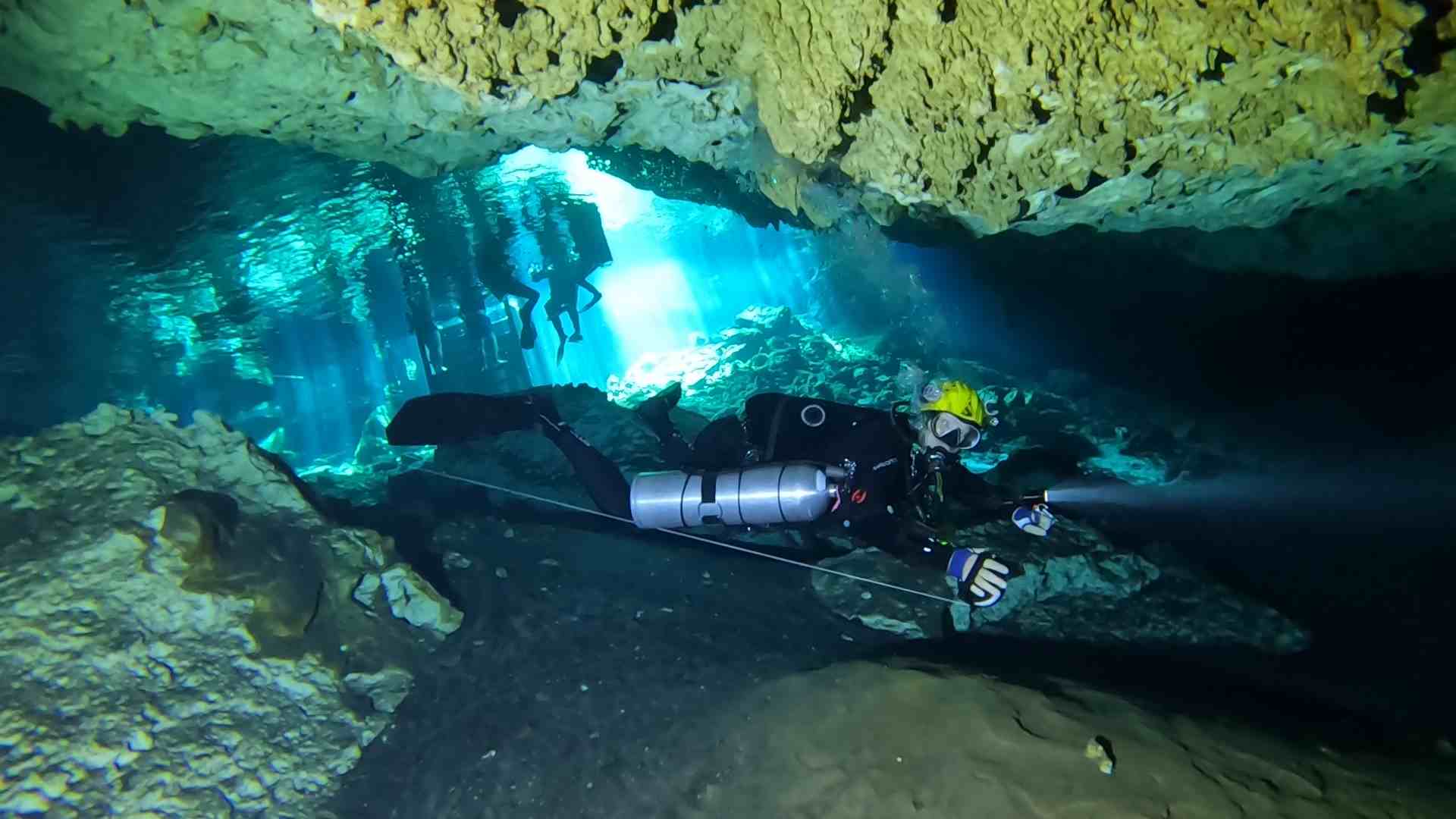 Cavern diver connecting to the permanent cavern line.