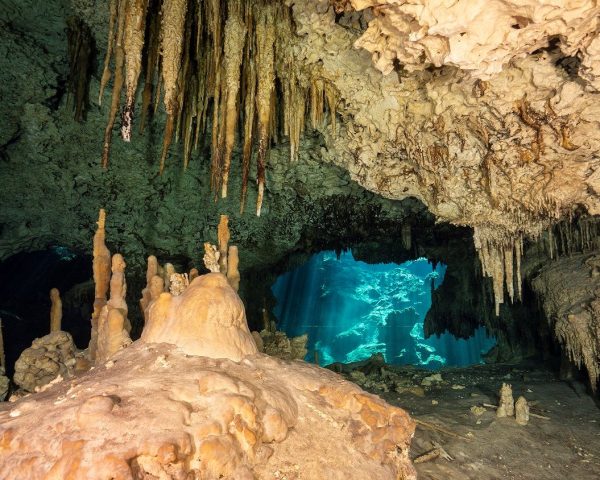 Stalactites and stalagmites in Cenote Chac Mool